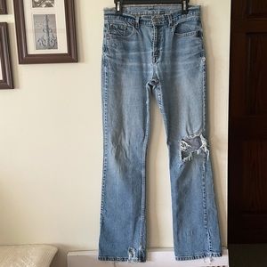TRUE 90’s VINTAGE LEVI’S 515 JEANS - Naturally Distressed Destroyed